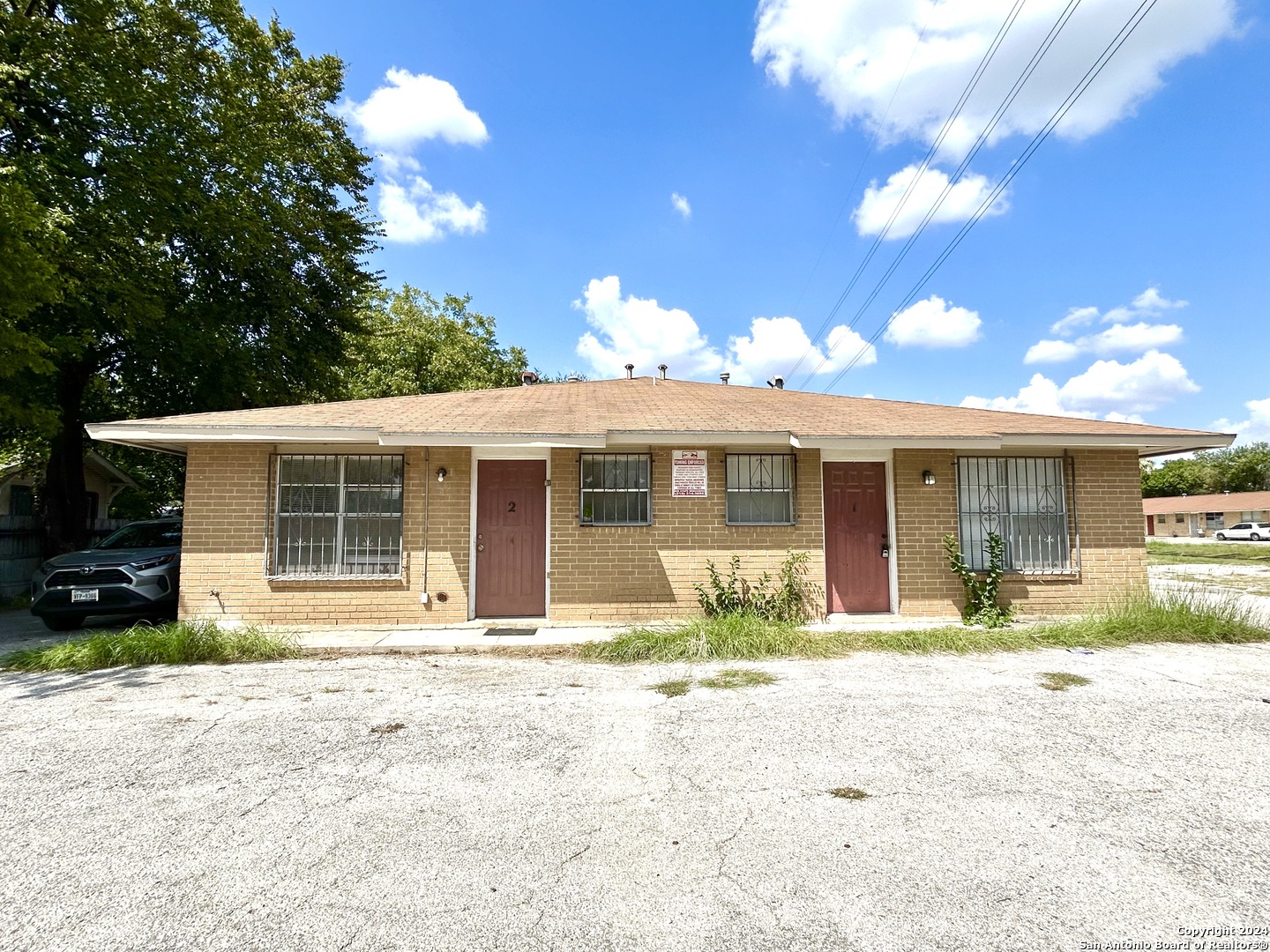 a front view of a house with a patio