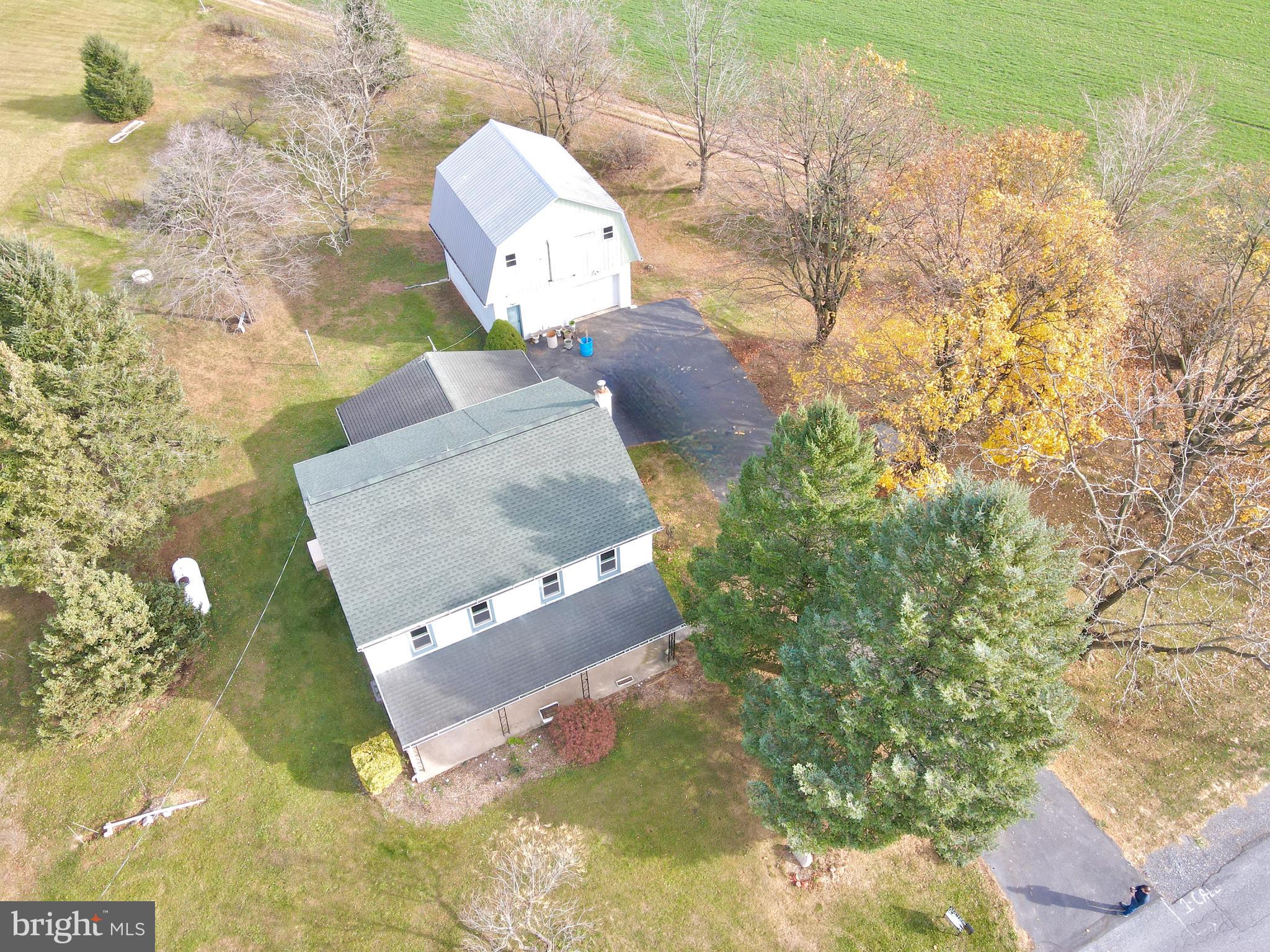 view of a house with a yard