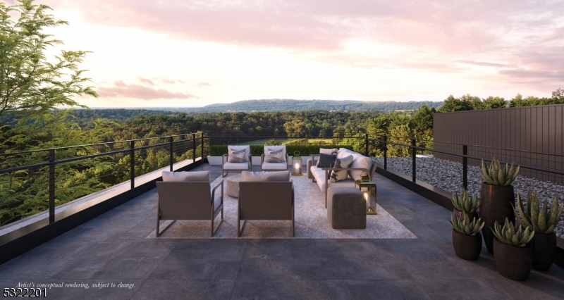 a view of a terrace with furniture