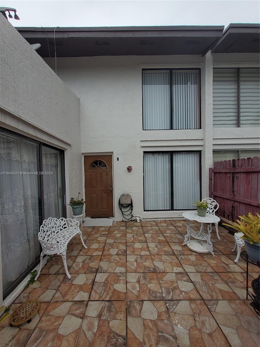 a house view with a outdoor space