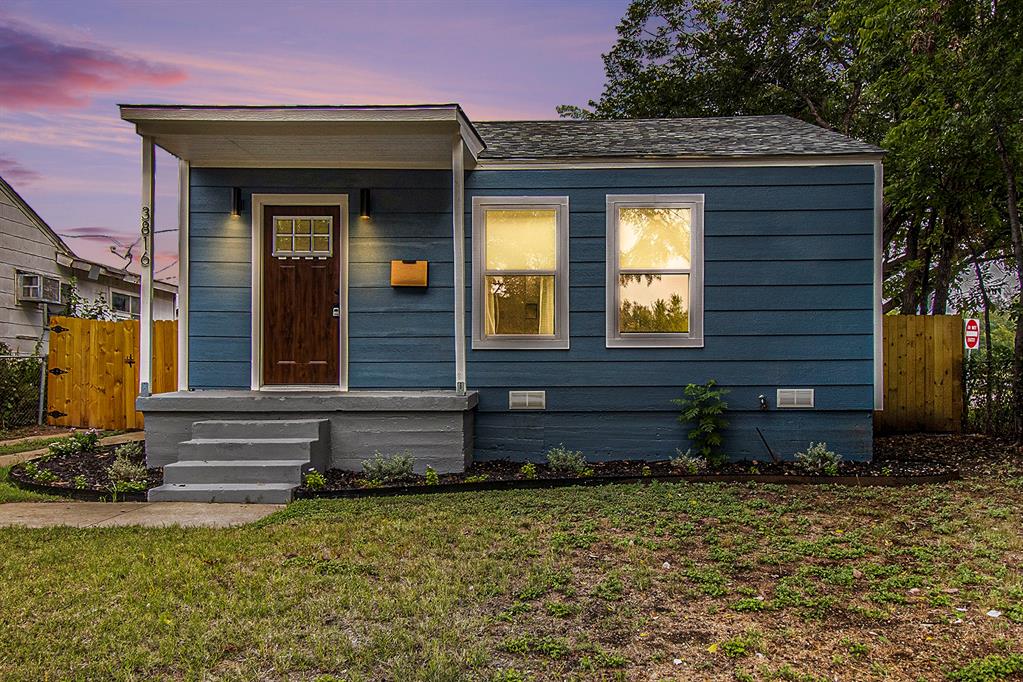 a front view of a house having yard