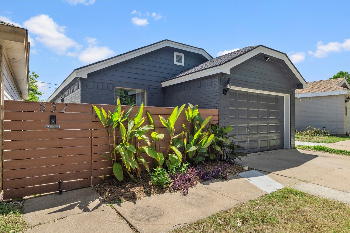 This privacy fence is polywood and creates a great courtyard/ sitting area inside of the fenced in area.