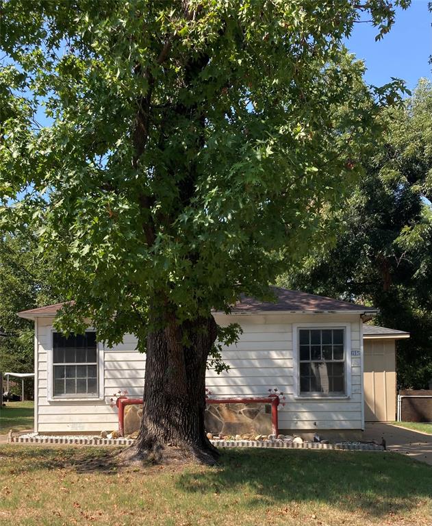 front view of house with a yard