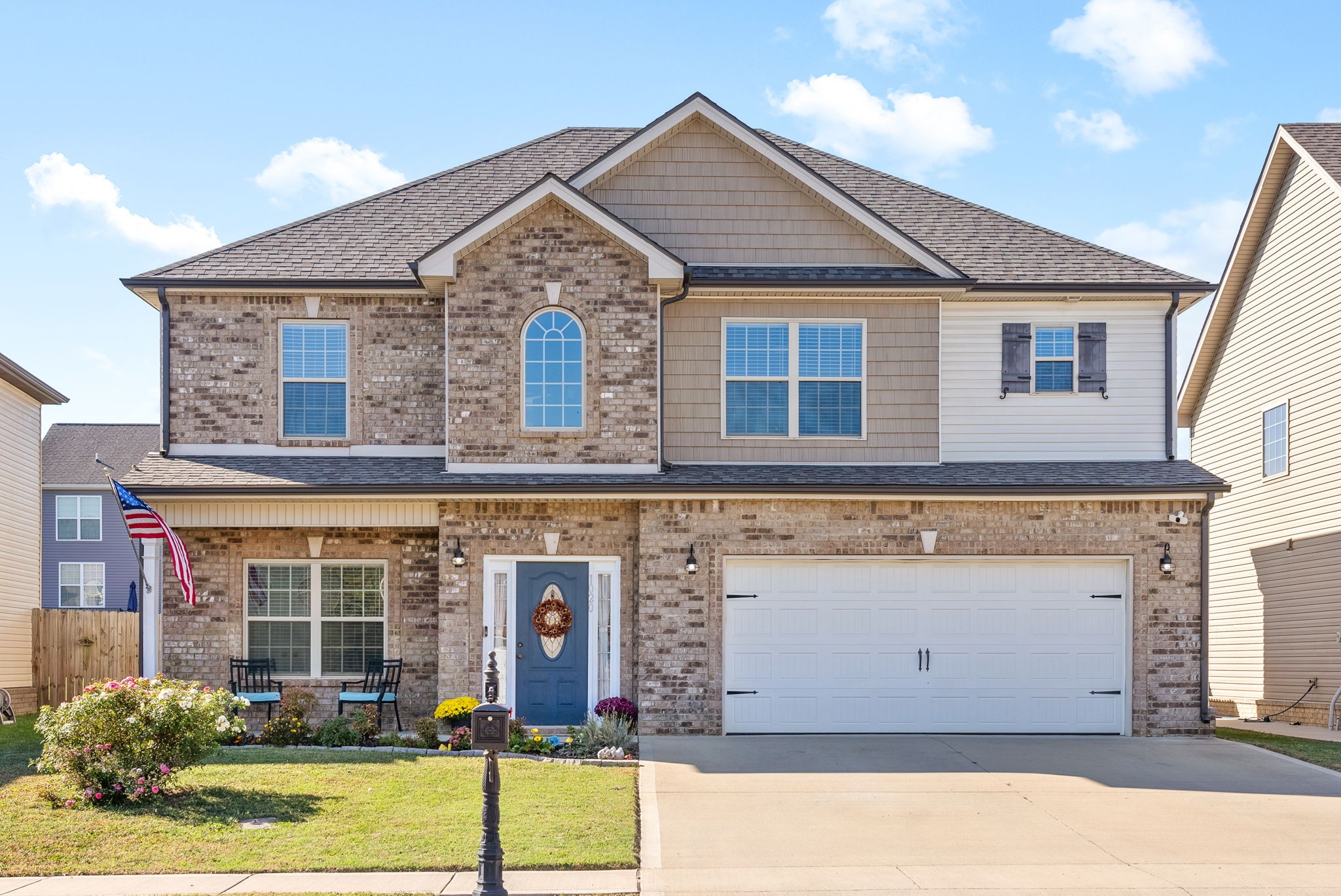 front view of a house with a garage