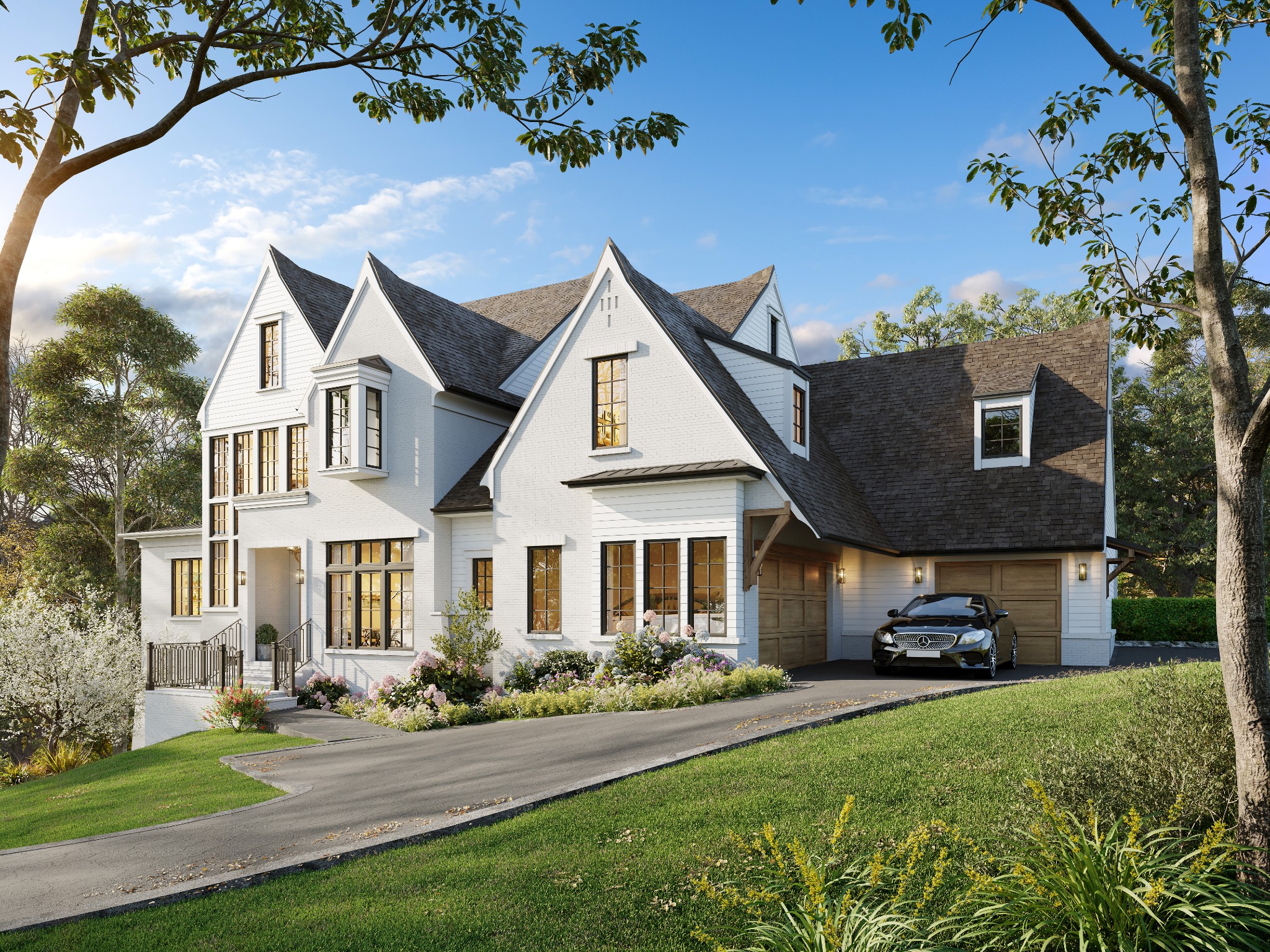 a front view of a house with a garden and yard