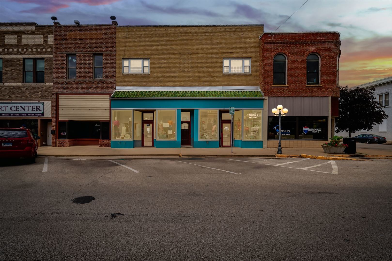 a view of a building with a street