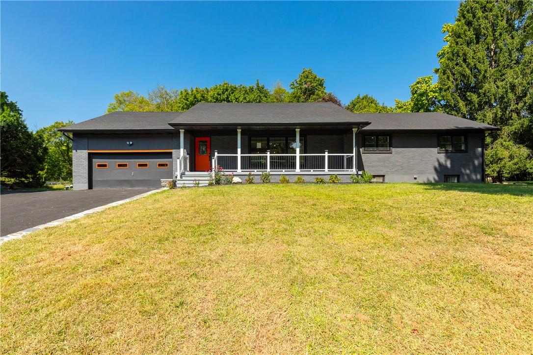 a view of a house with a swimming pool