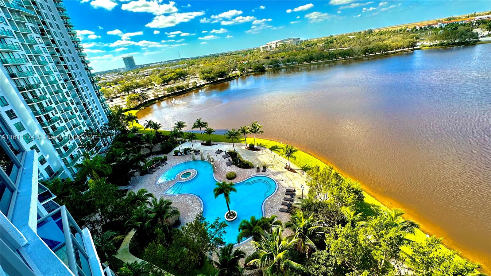 an aerial view of a house a swimming pool and outdoor space