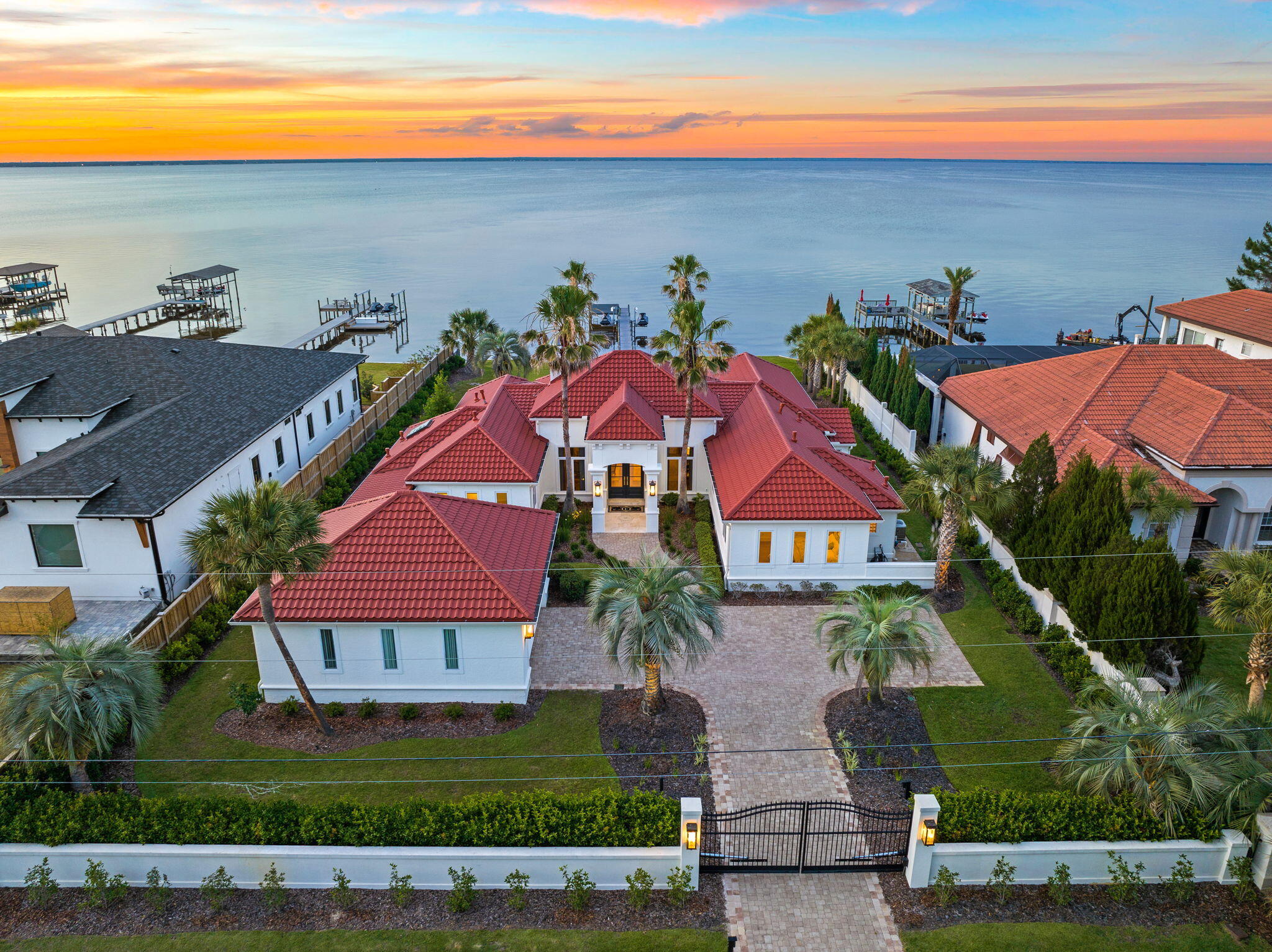 an aerial view of multiple houses with yard