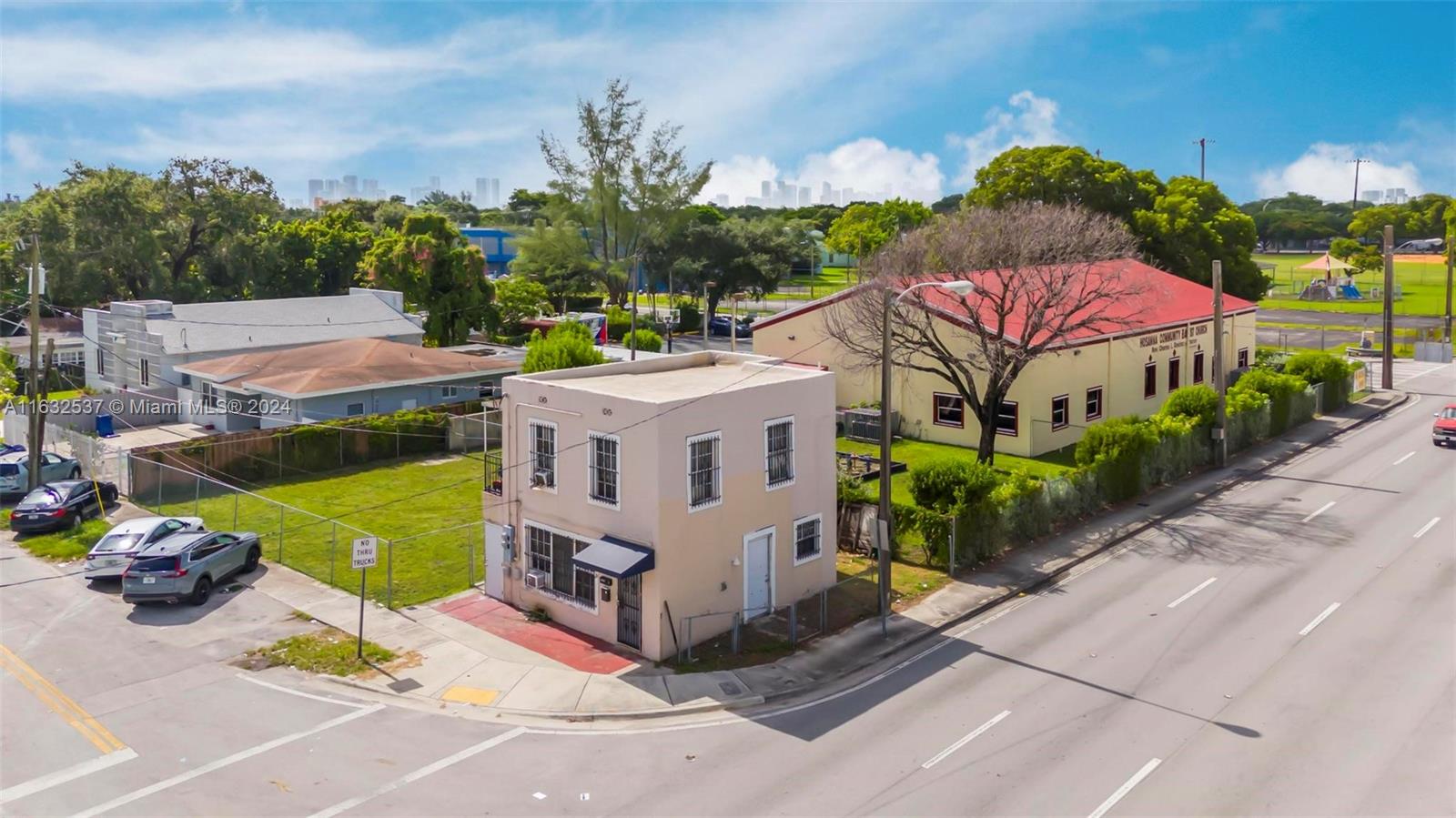 an aerial view of a house with a garden