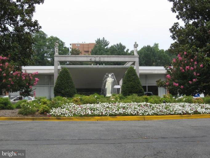 The front entrance with guest parking