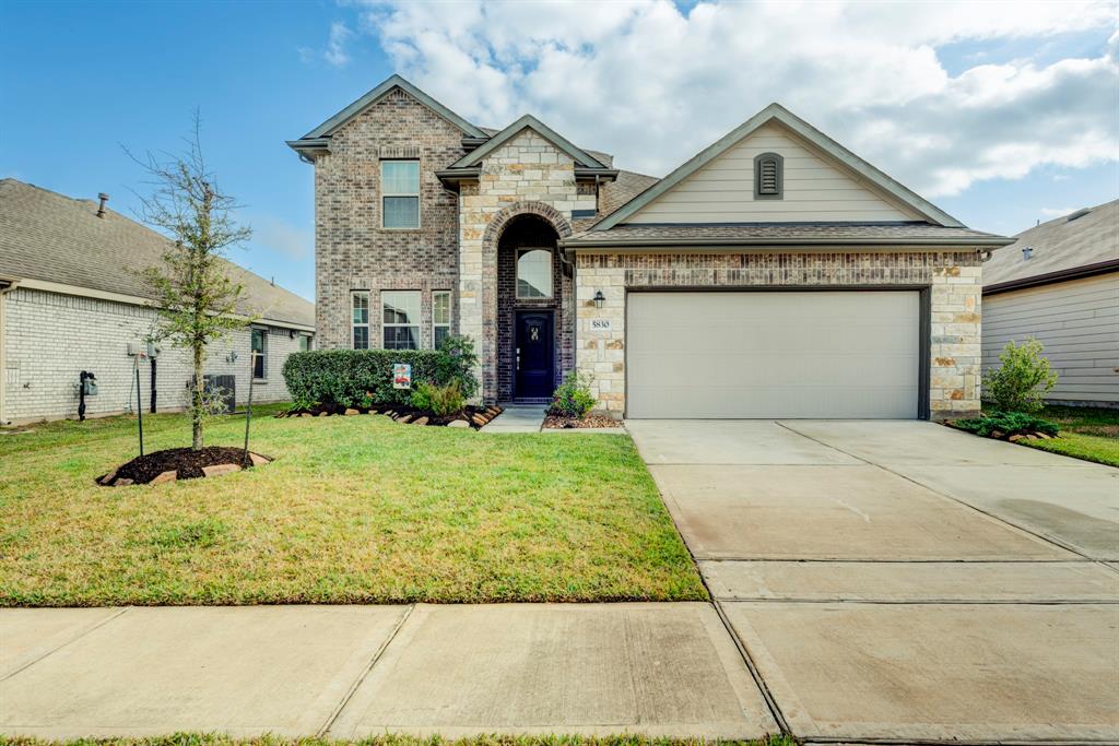 Amazing curb appeal with brick and stone