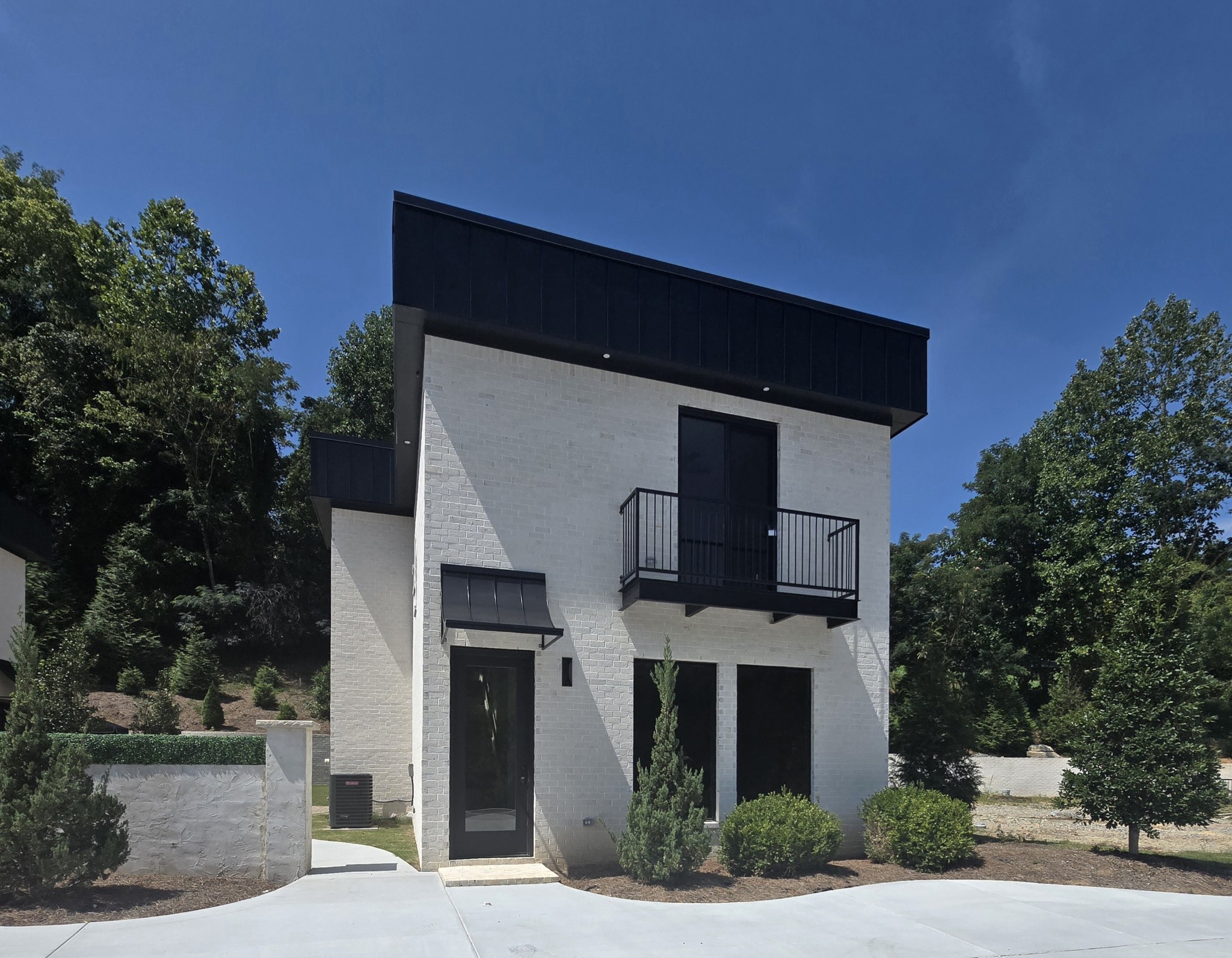 a front view of a house with yard