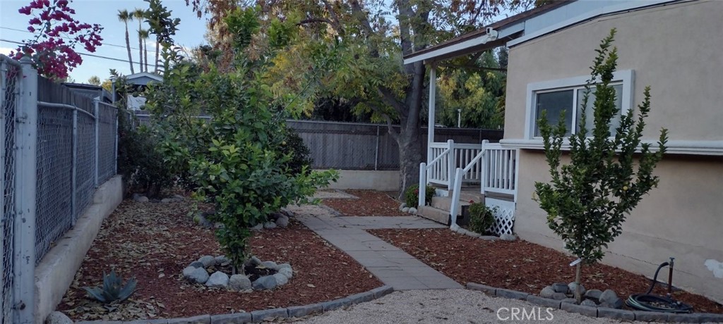 a view of a backyard with garden