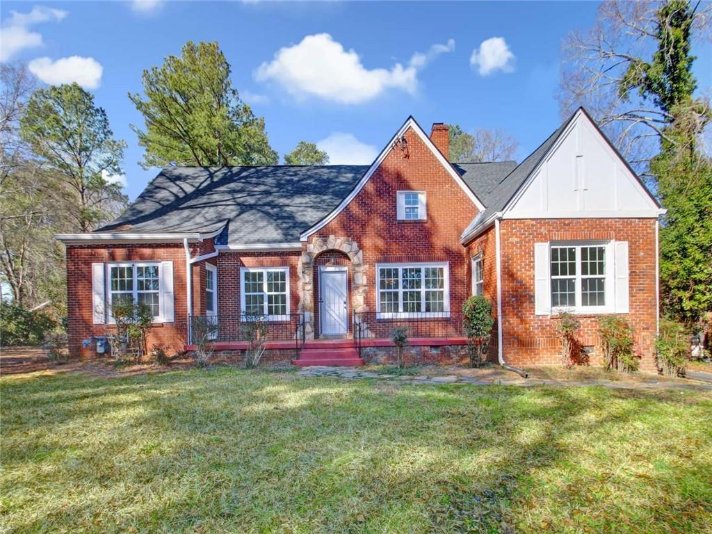 front view of a house with a yard