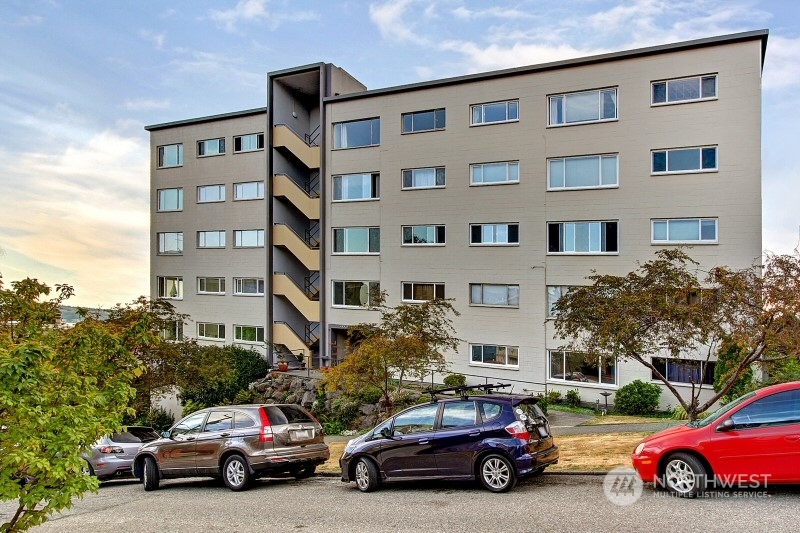 a car parked in front of a building