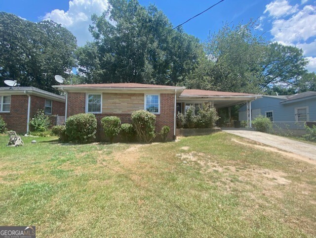 front view of house with a yard