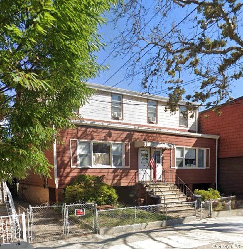 front view of a building with a street