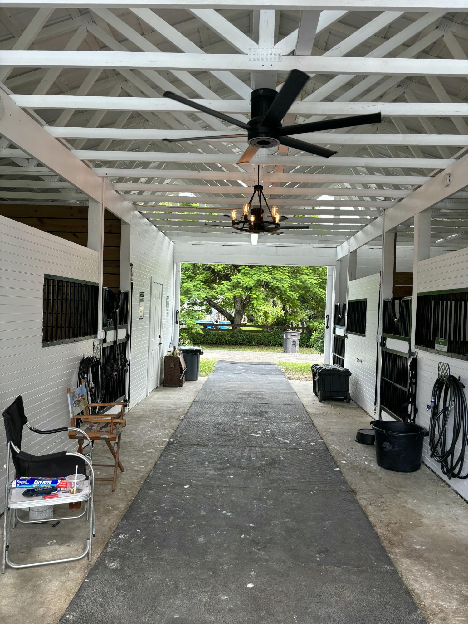 a view of a livingroom with furniture and a flat screen tv