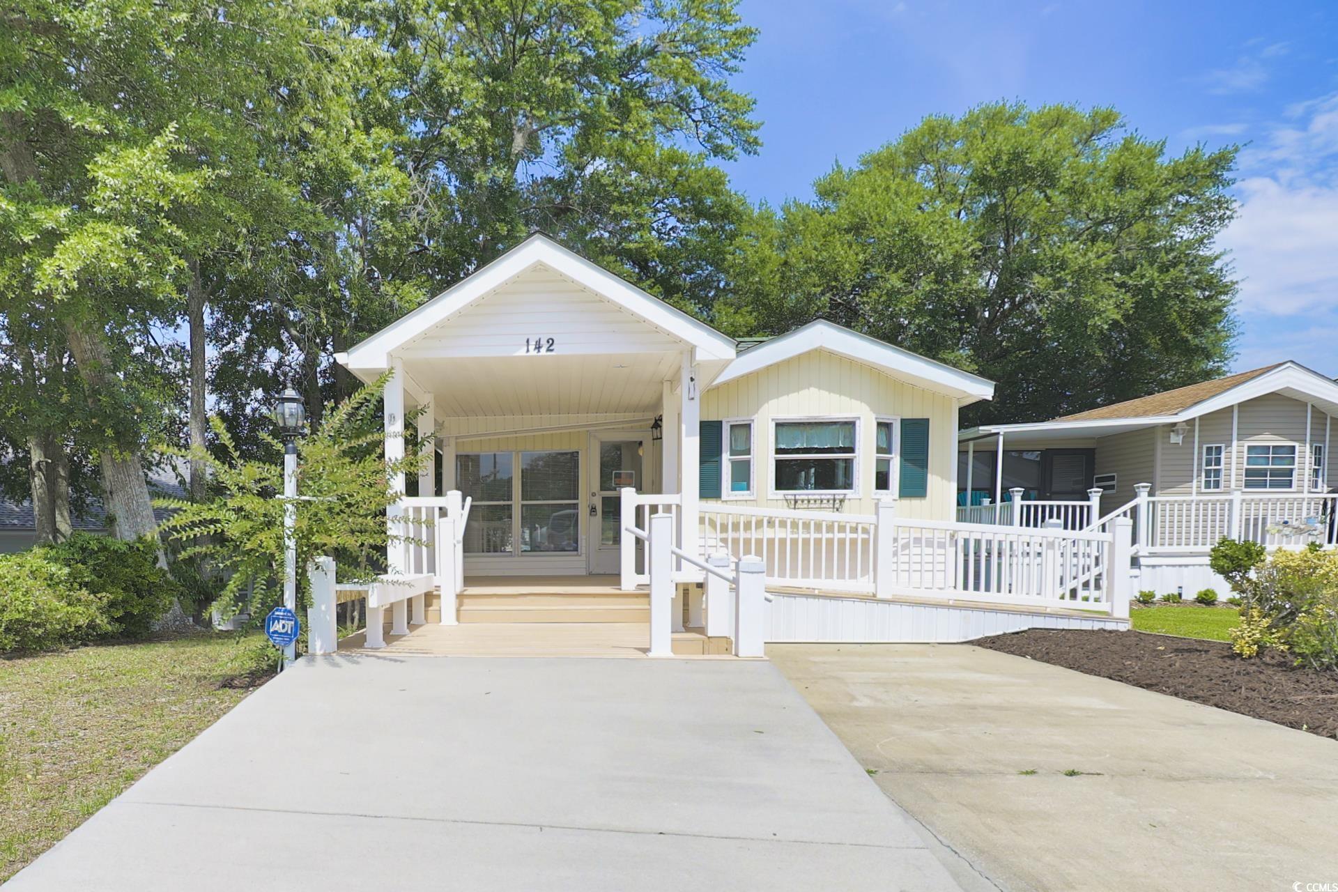 View of front facade featuring a porch