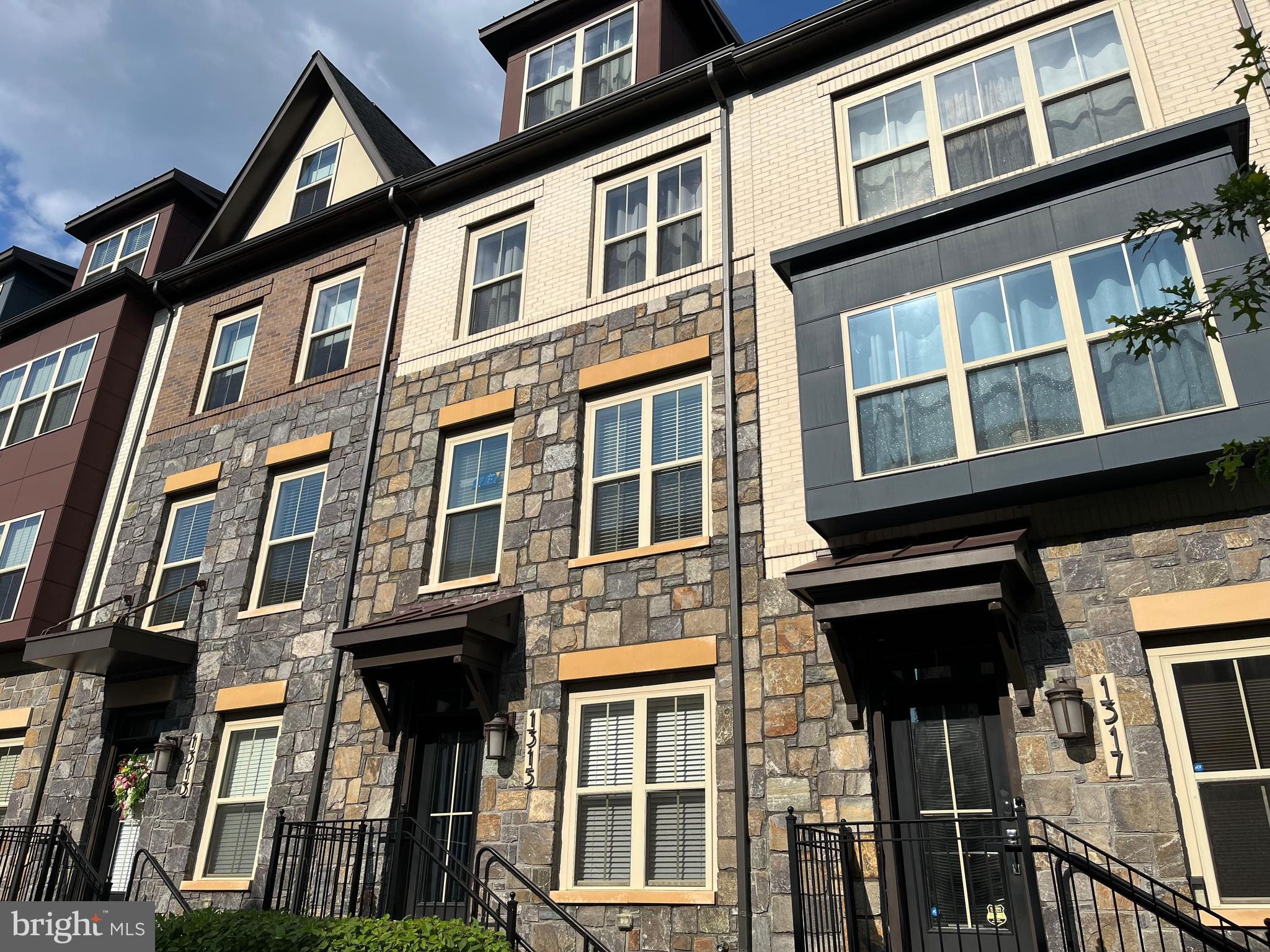 a front view of a multi story residential apartment building