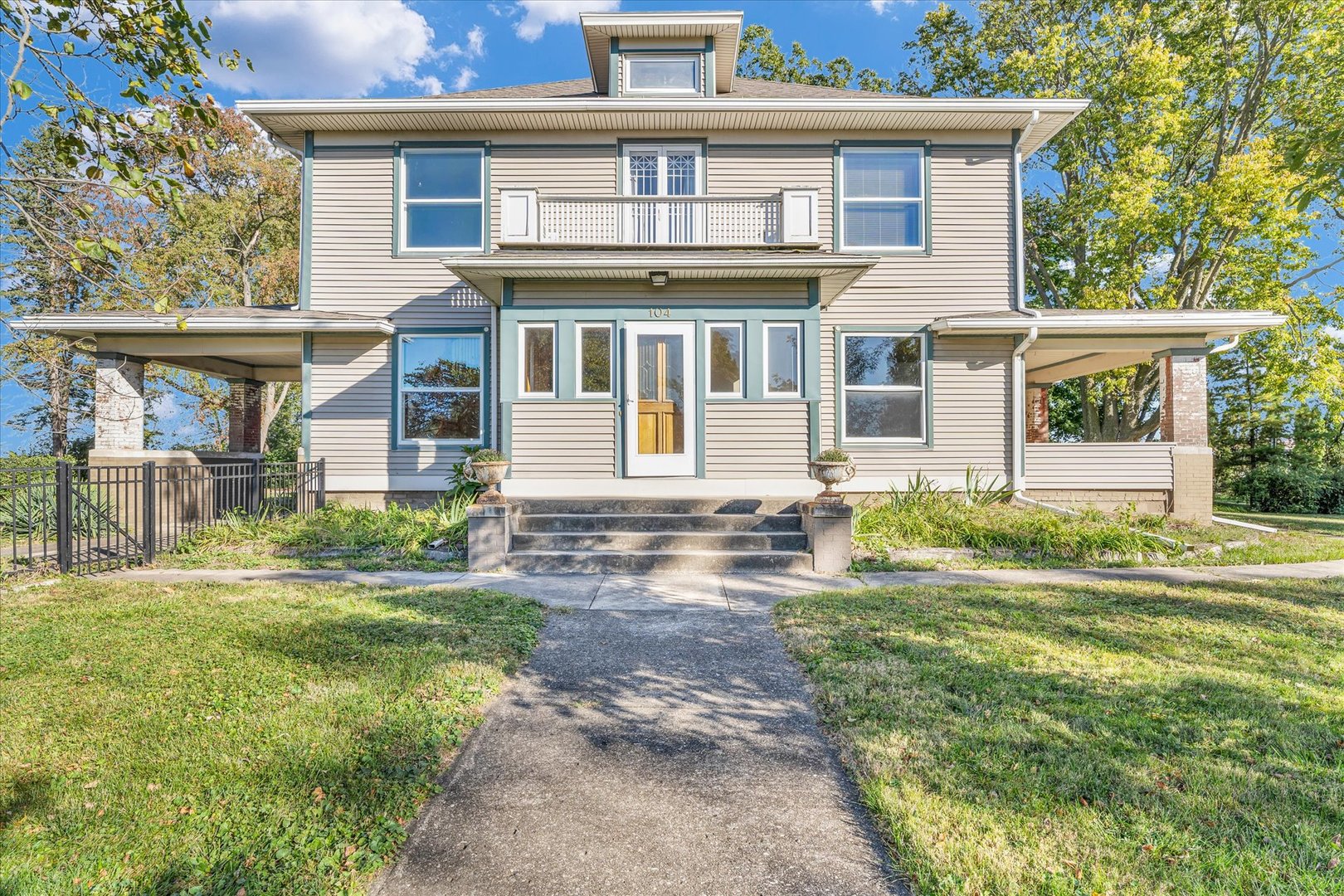 front view of a house with a yard