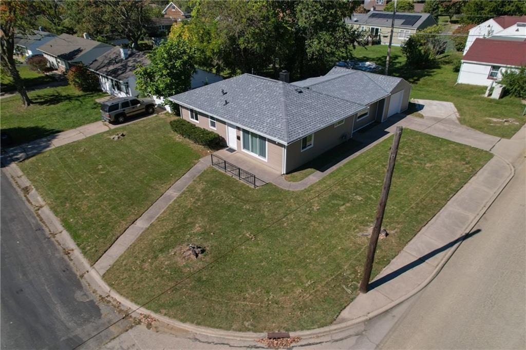 an aerial view of a house having yard