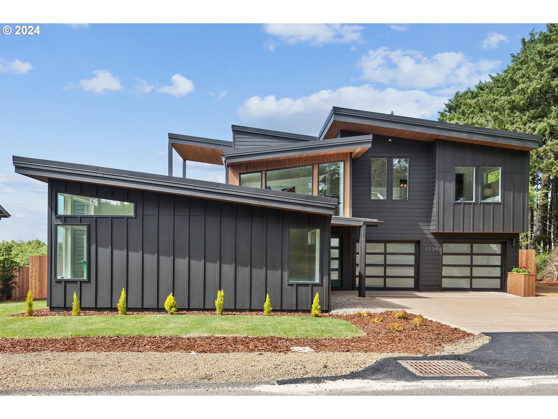 a house view with a backyard space