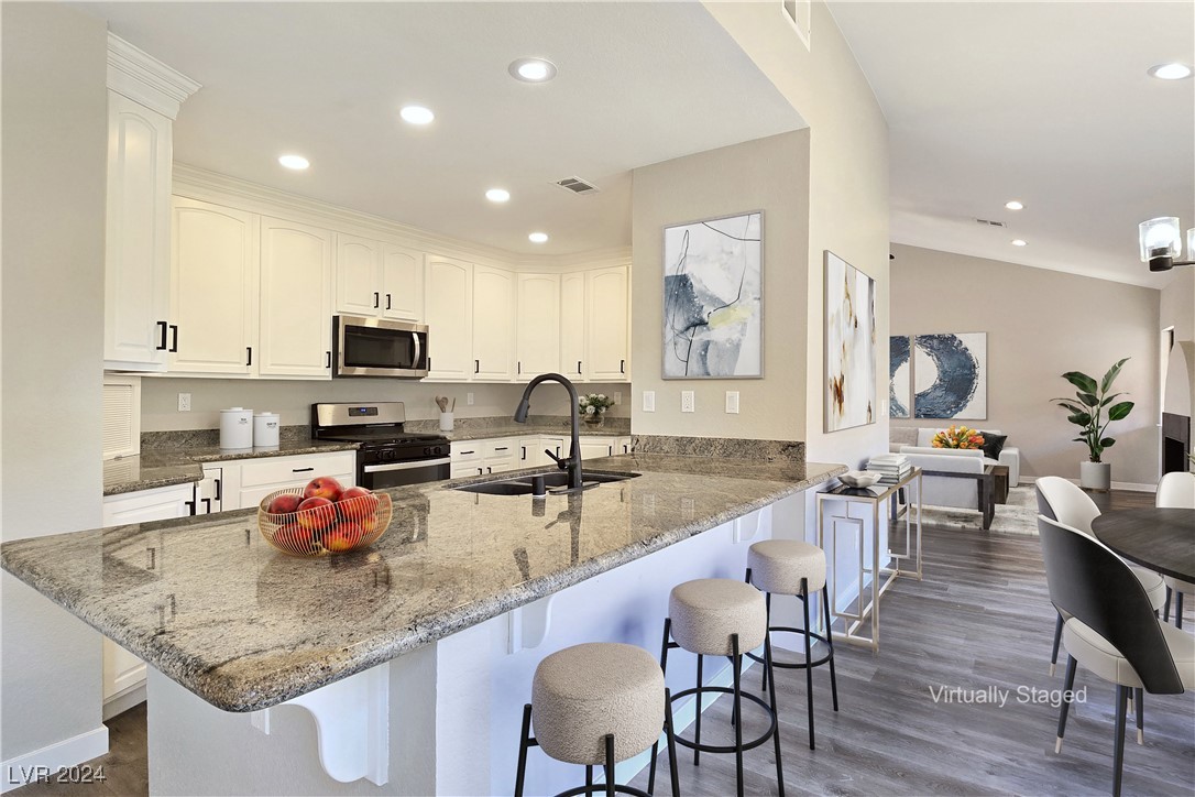 Virtually Staged - Kitchen features Granite Counte