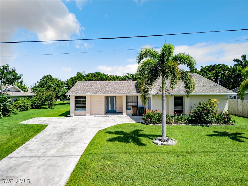 front view of a house and a yard