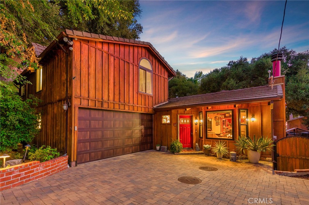 a backyard of a house with shaded area