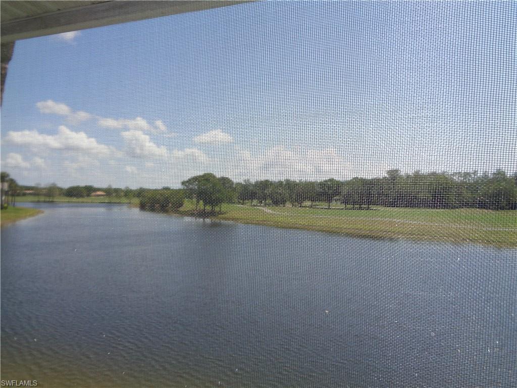 a view of a lake with a city