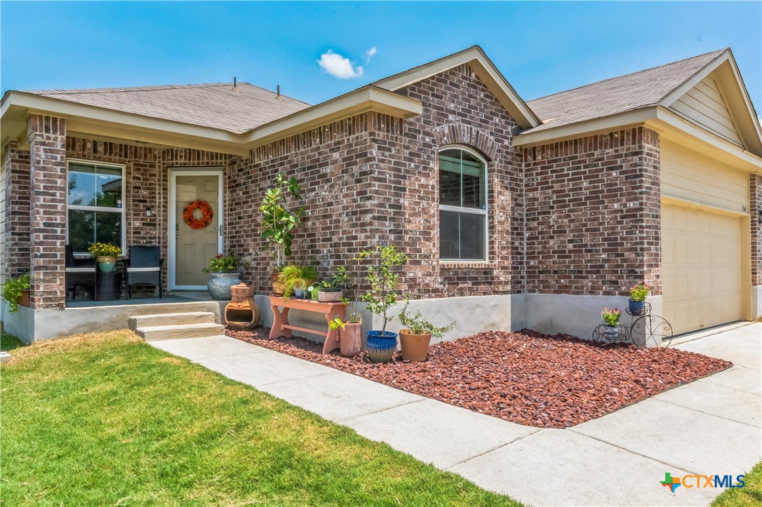 a front view of a house with patio