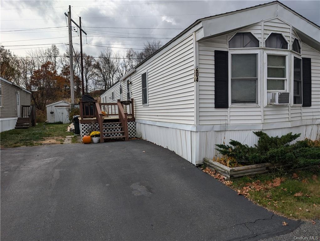 a view of a house with a street