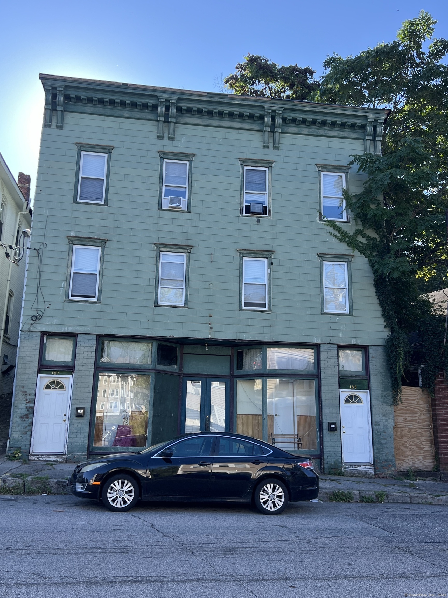 a car parked in front of a building