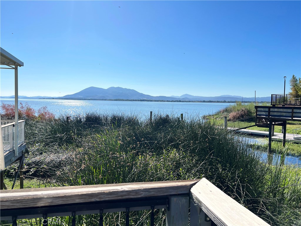 a view of a lake from a balcony