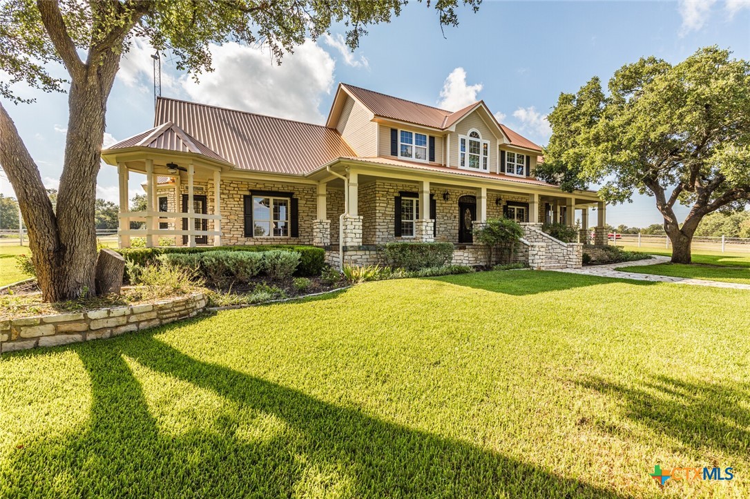 a view of a house with a swimming pool