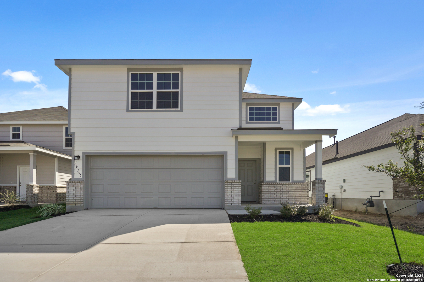 a front view of house with yard