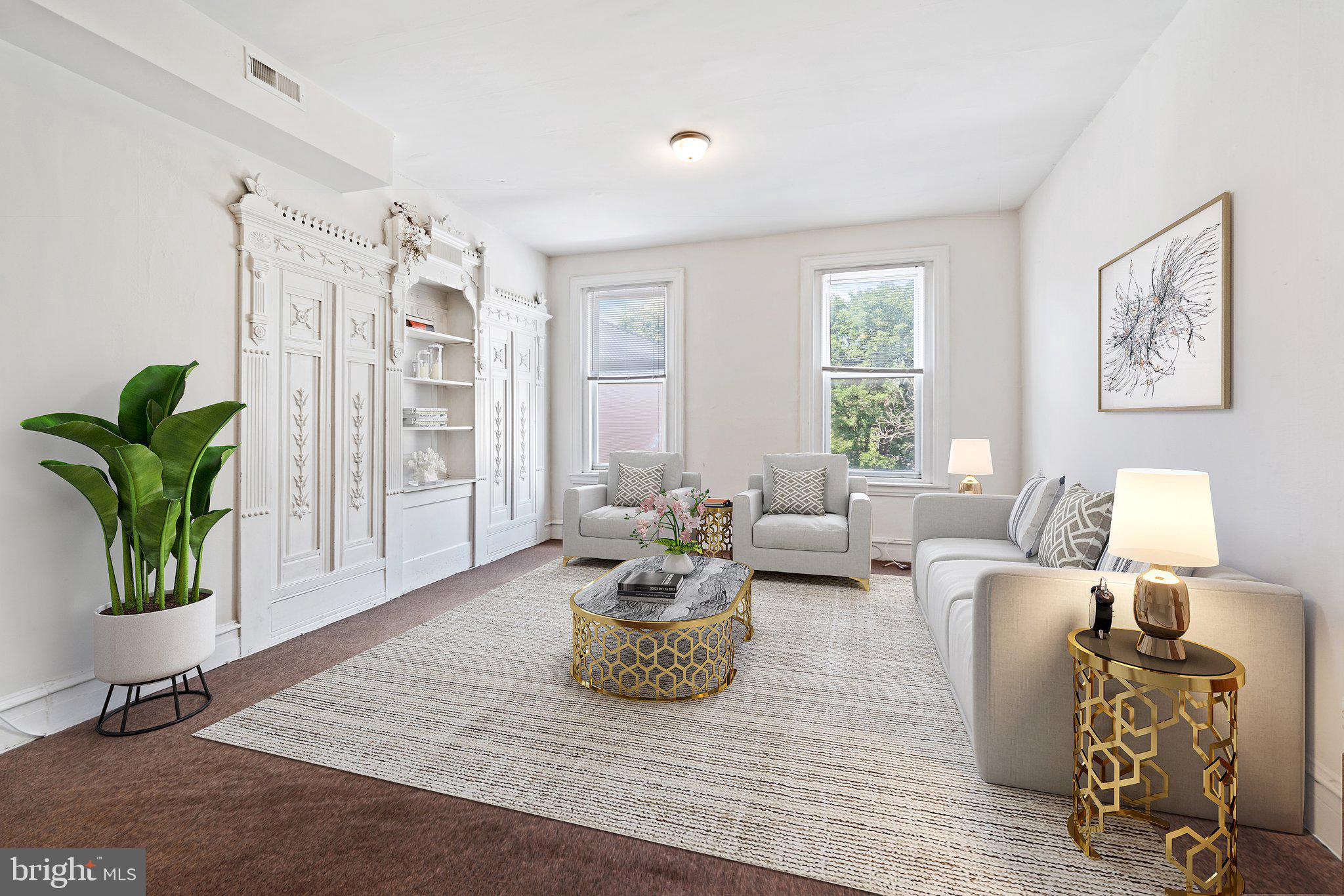 a living room with furniture flowerpot and window