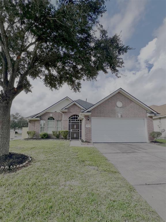 a big house with a big yard and large trees