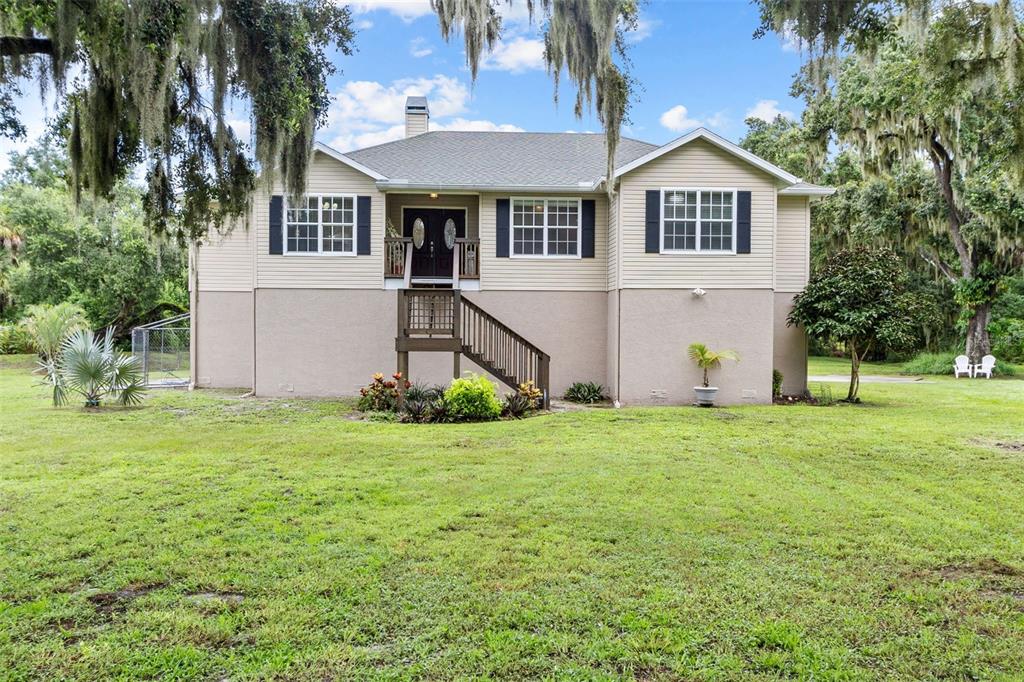 front view of a house with a yard