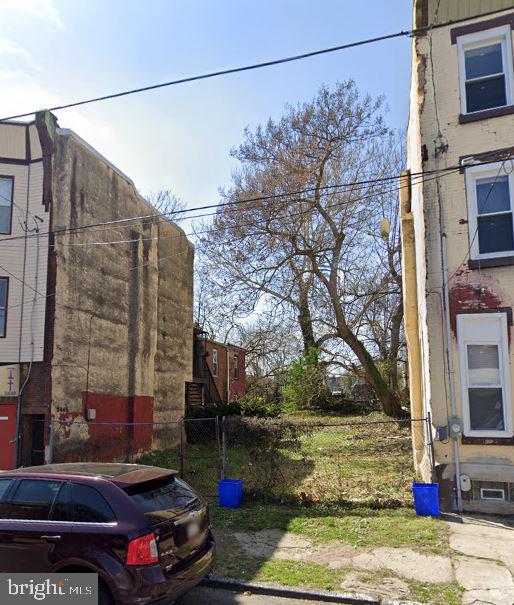 a backyard view of a building