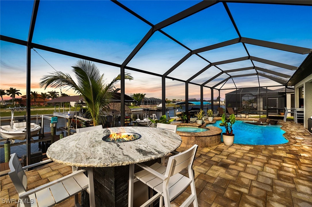 a view of a patio with swimming pool