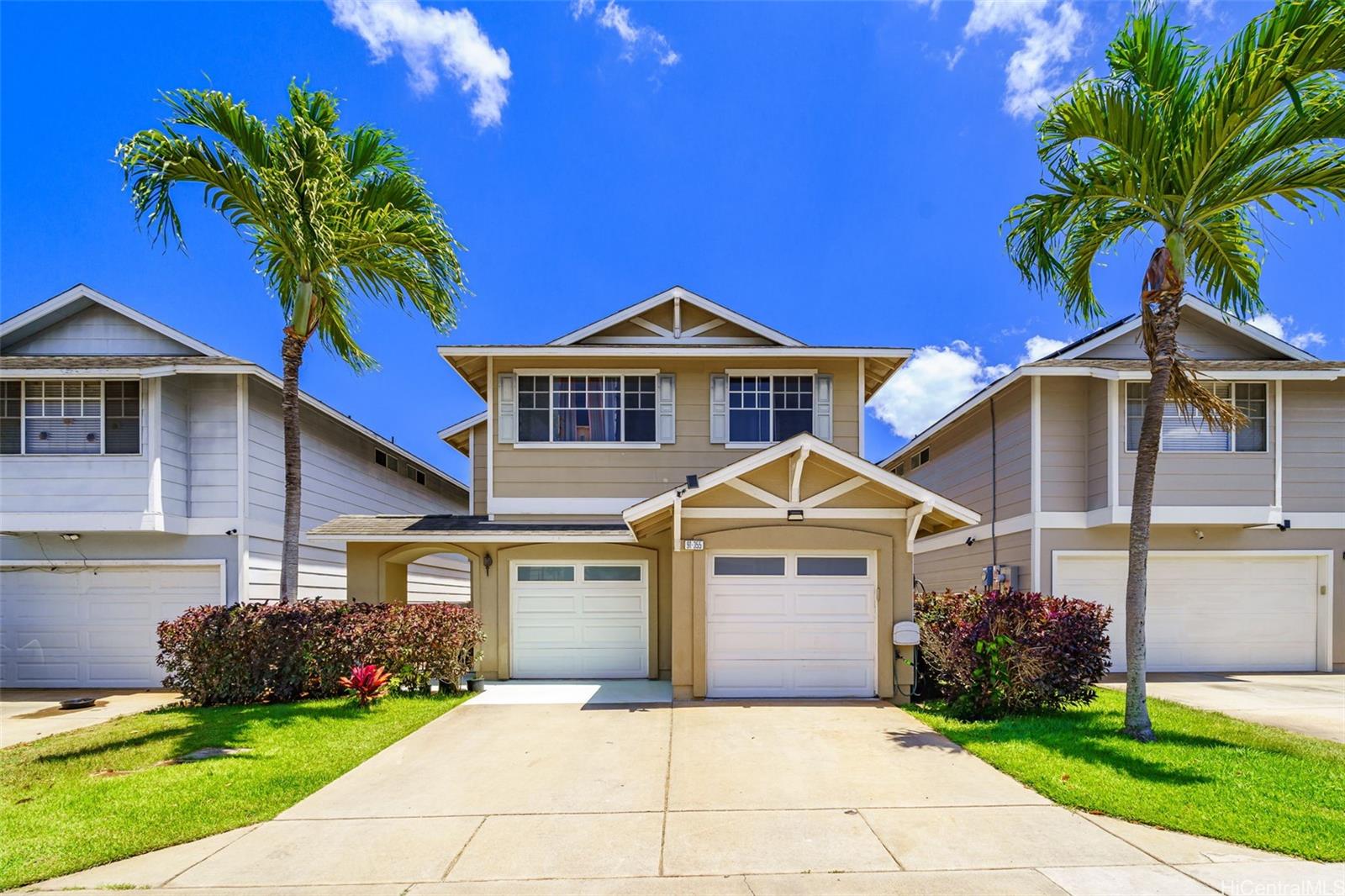 Welcome home! Two cars can park in driveway as well, not all homes in this development have that luxury.