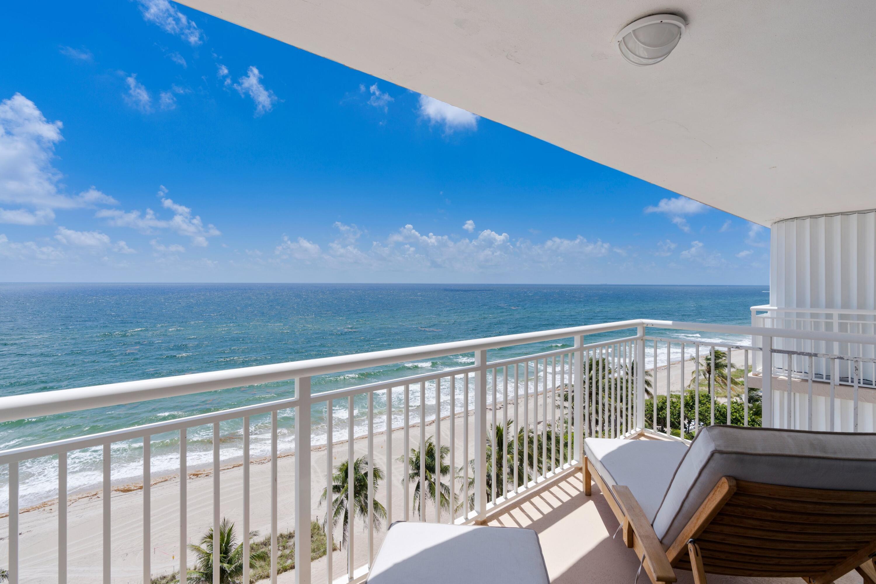 a view of a balcony with chair