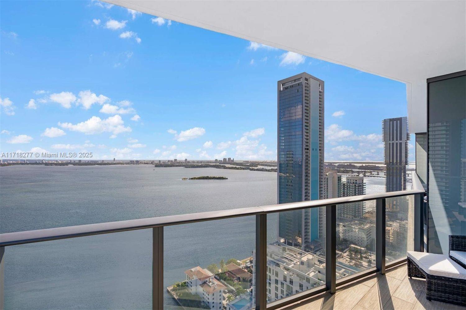 a view of a balcony with lake view