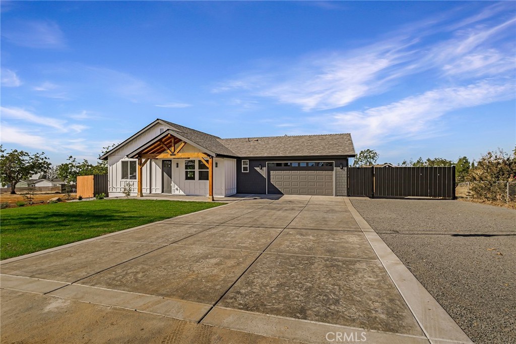 a view of house with outdoor space and street view