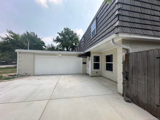 a view of a house with a garage