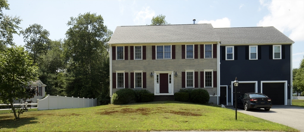 a view of a house with a swimming pool