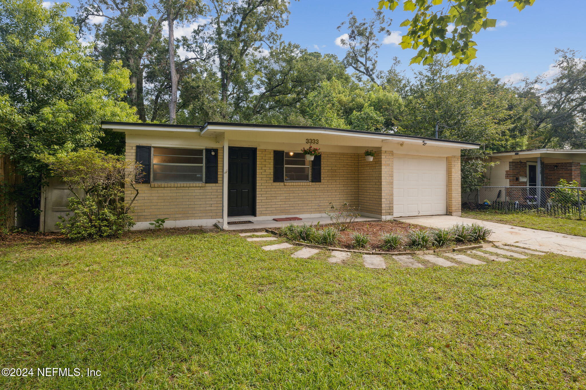 front view of house with a yard